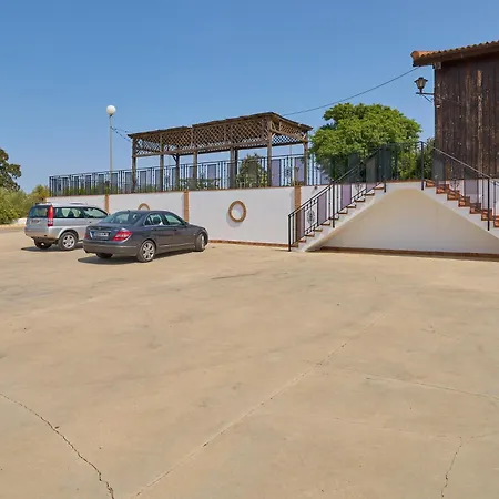 La Piscina Y Jardin Сasa de vacaciones La Carlota